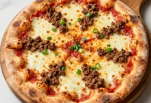 طريقة عمل بيتزا باللحم المفروم: أسرار العجينة الهشة والحشوة المميزة